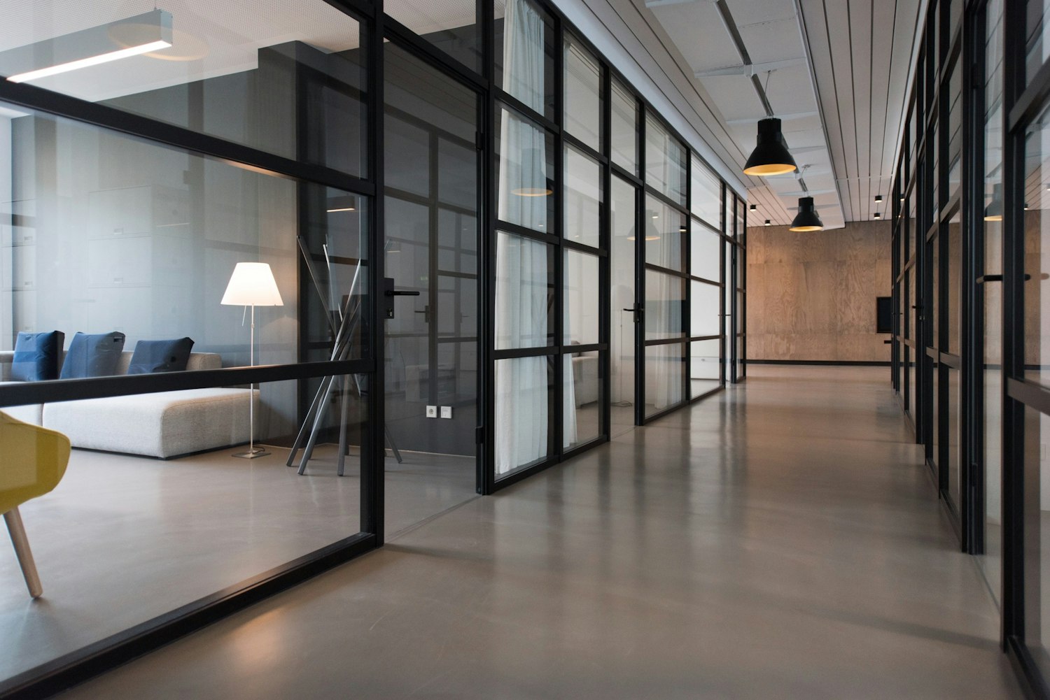 Illustrative bright collaborative workspace with tables and seating